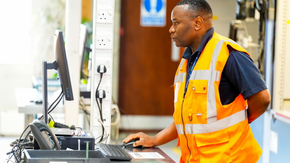 Port of Felixstowe employee working on computer