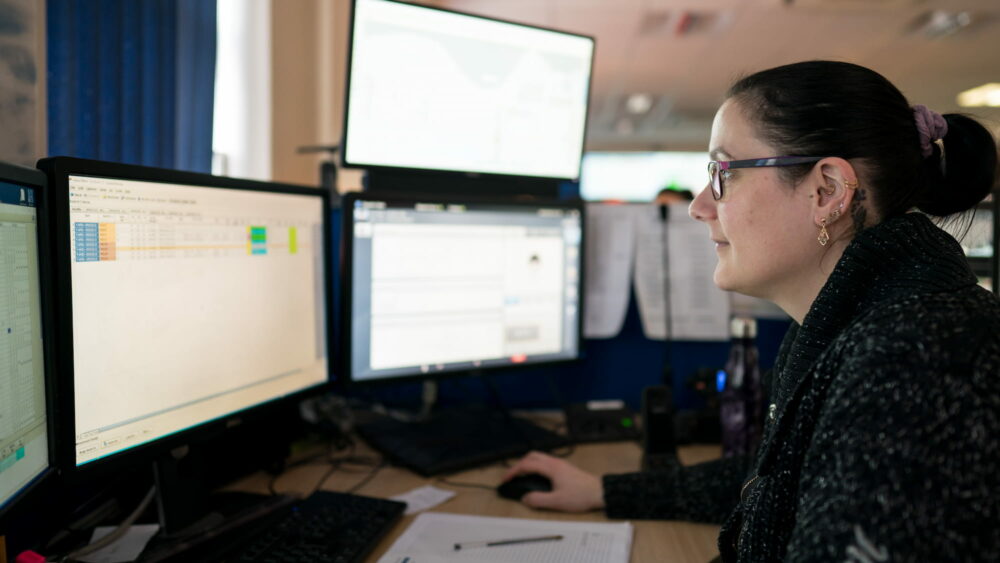 Female employee from Port of Felixstowe on computer